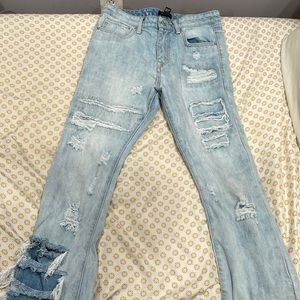 forever 21 slim flair, size 32 in women’s blue denim jeans with rips
